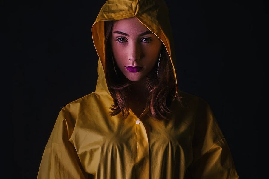 Woman wearing a yellow cagoule