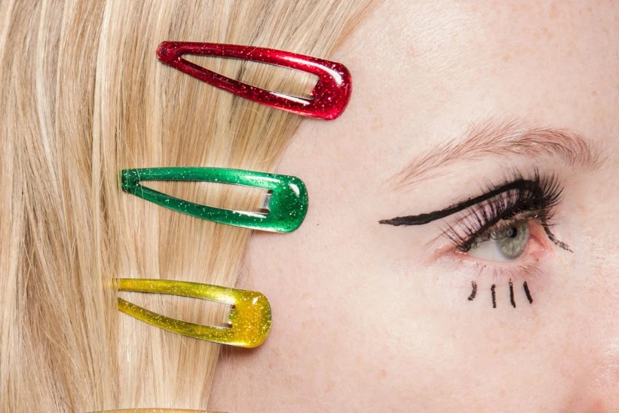 Woman wearing hair clips with Christmas colors