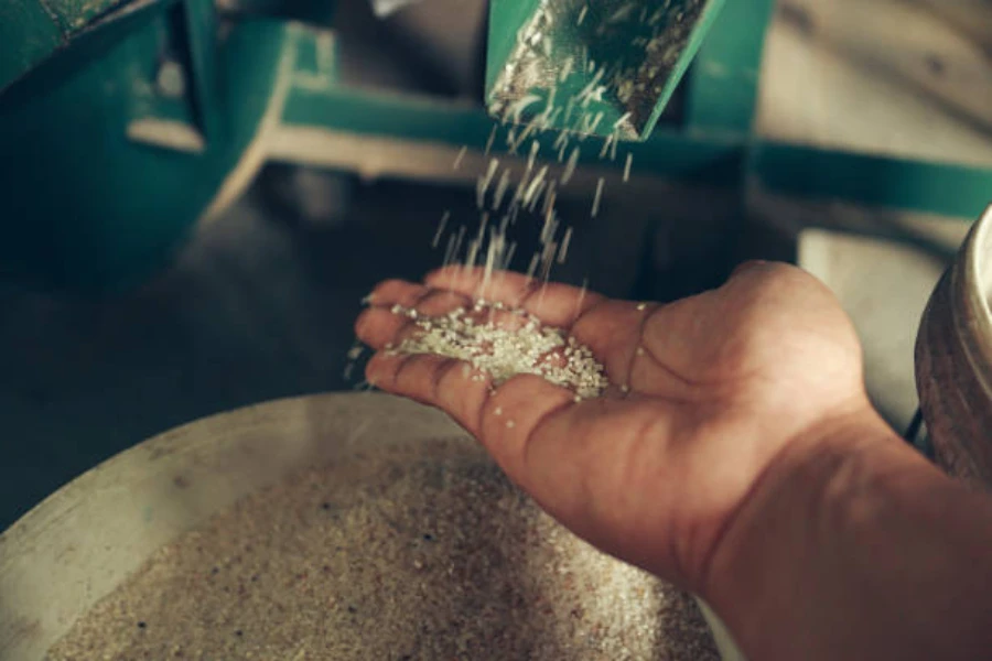 A close-up of a rice milling machine