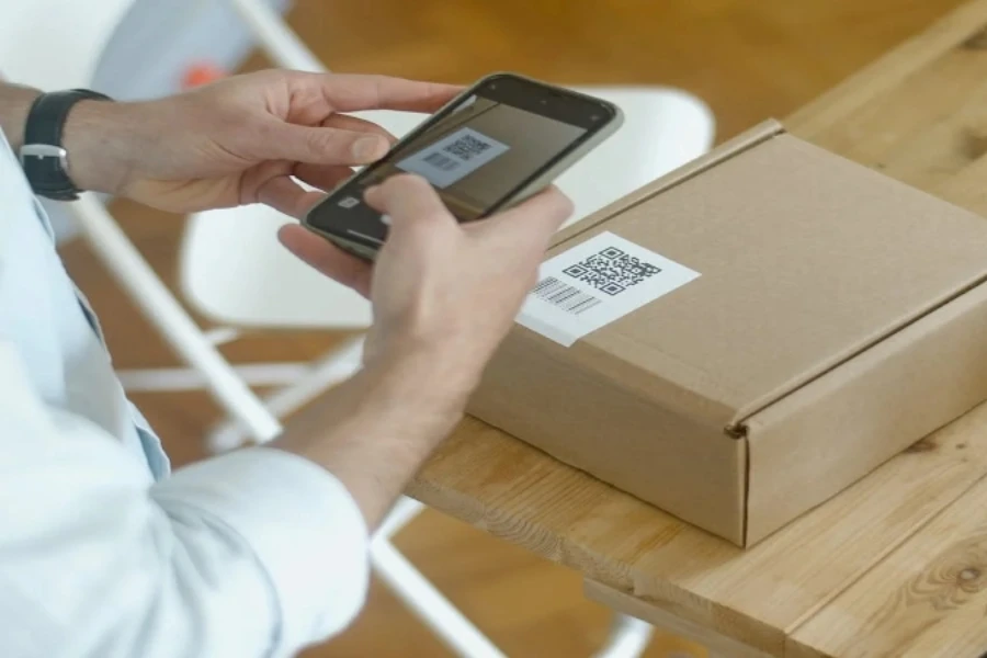 A close-up shot of a person scanning a QR code