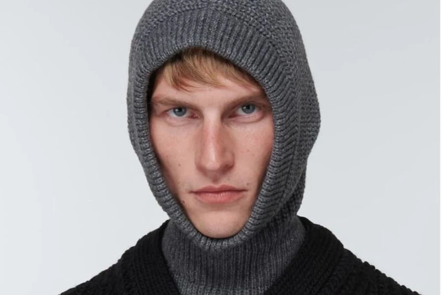 A man wearing a gray knit cashmere one-hole balaclava