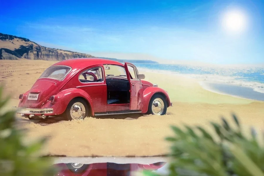 A model featuring red car on a beach