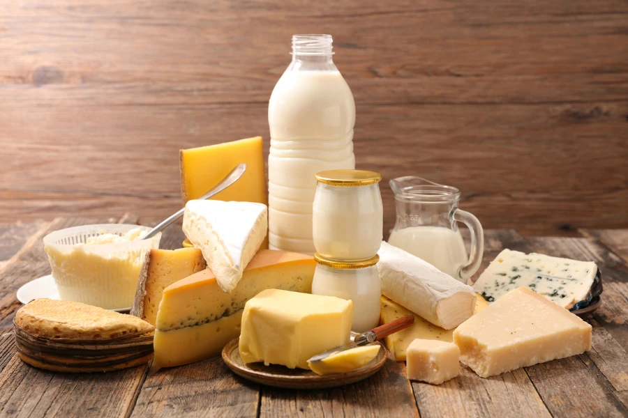 Assortment of milk products on a wooden background
