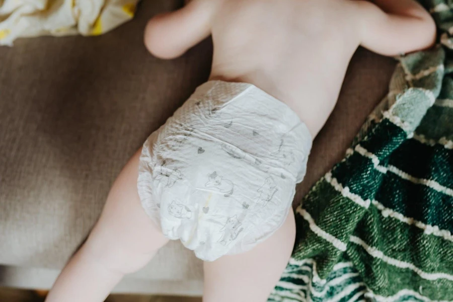 Baby sleeping while wearing a lightweight diaper