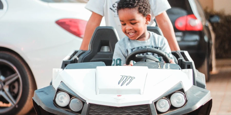Child riding a white ride-on toy car