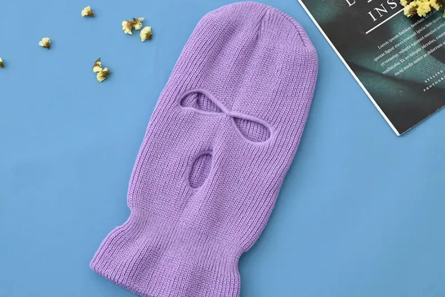 Lilac colored ski mask with slits for eyes and mouth