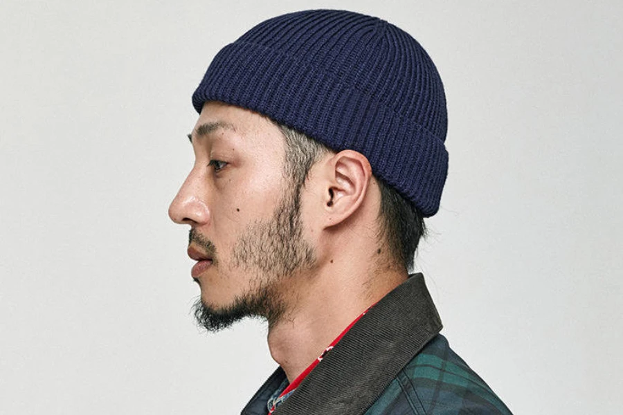 Man wearing a black fisherman beanie