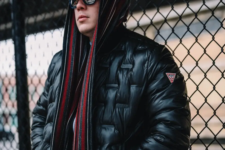 Man wearing a black quilted jacket