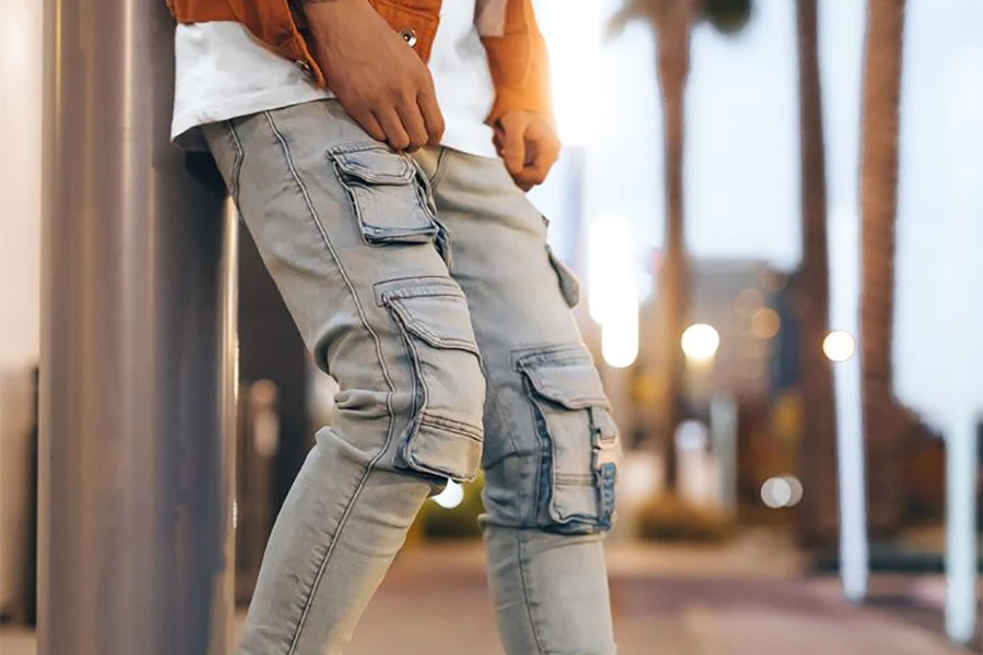 Man wearing a stone-wash utility denim pants