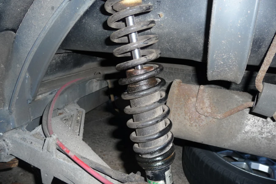 Old car shock absorber needing replacement