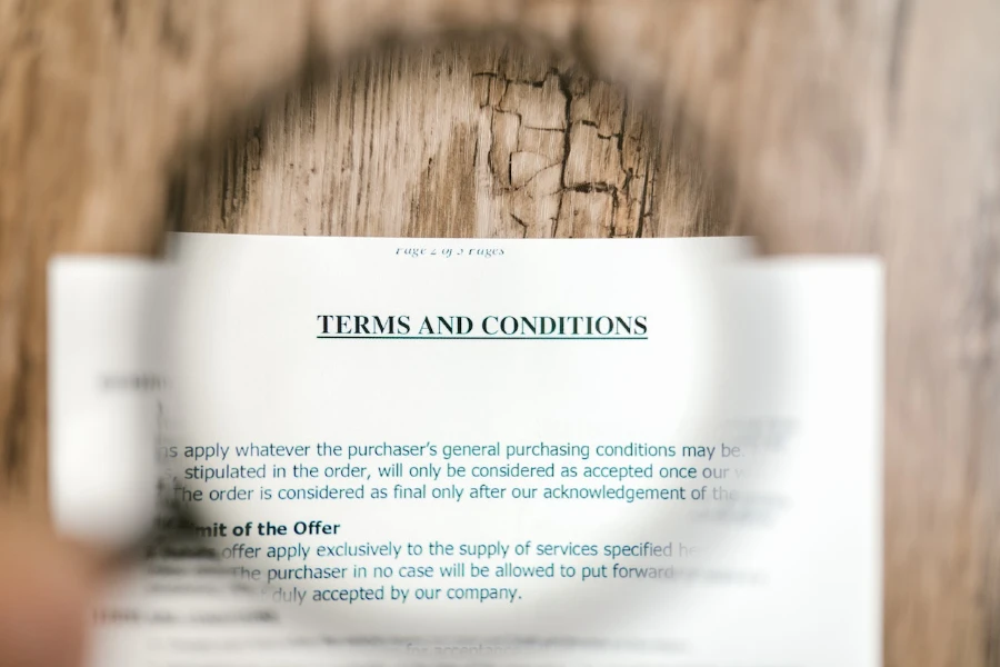 Selective focus of terms and conditions written on a paper