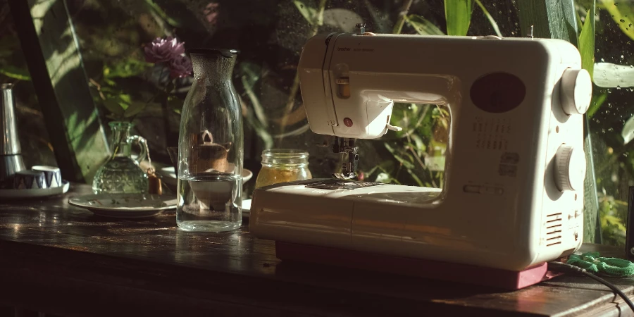 Shallow focus photo of sewing machine