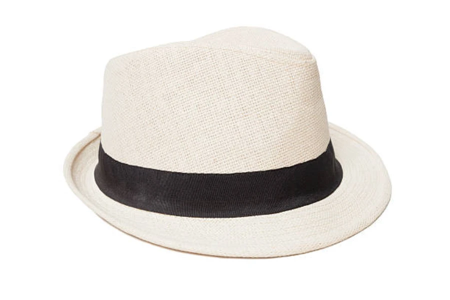 Traditional white Panama hat with black ribbon around it