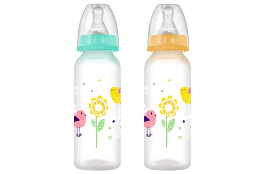 Two baby bottles with traditional nipples