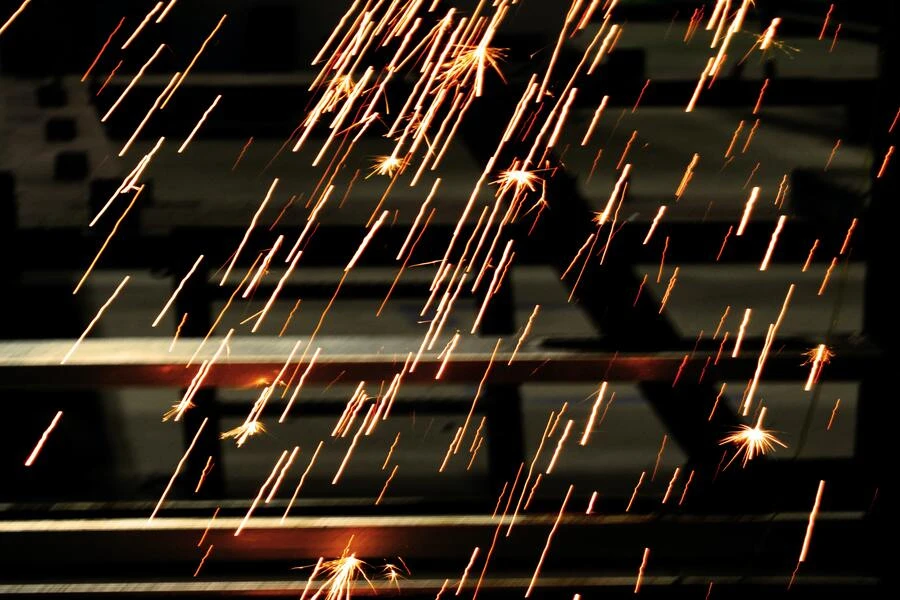 Welding sparks at a work site