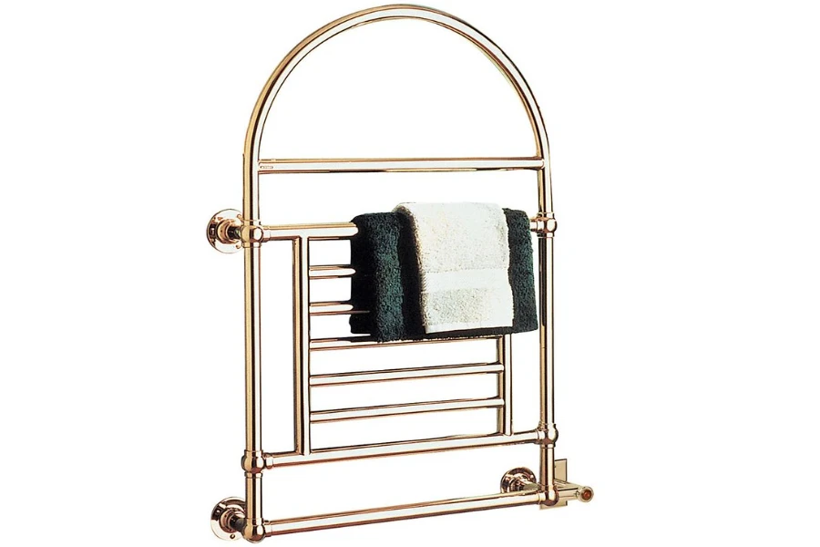 A classic satin nickel electric towel warmer with green and white towels