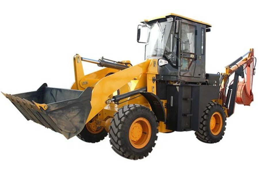 a used tractor with front loader and rear backhoe attachments
