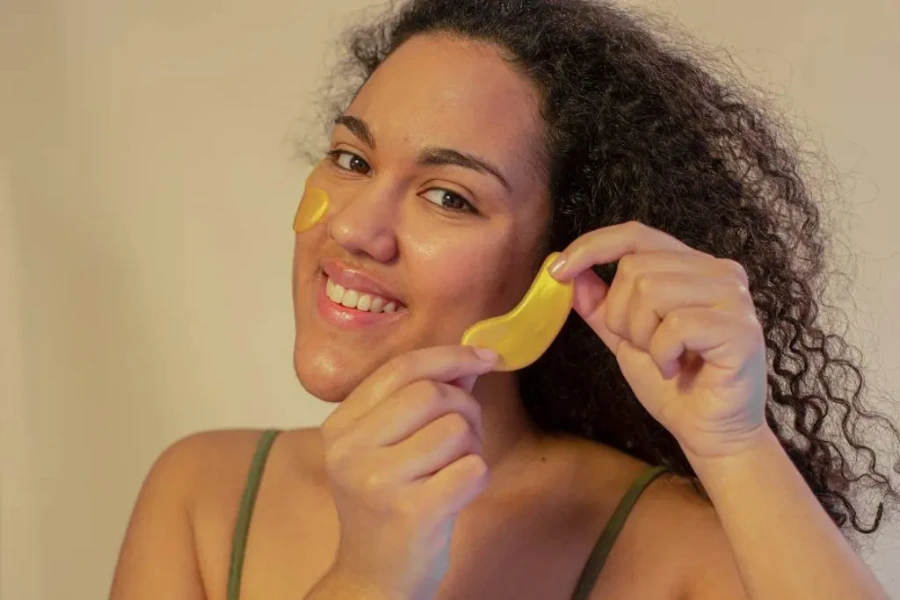 A woman in a yellow colored face pods