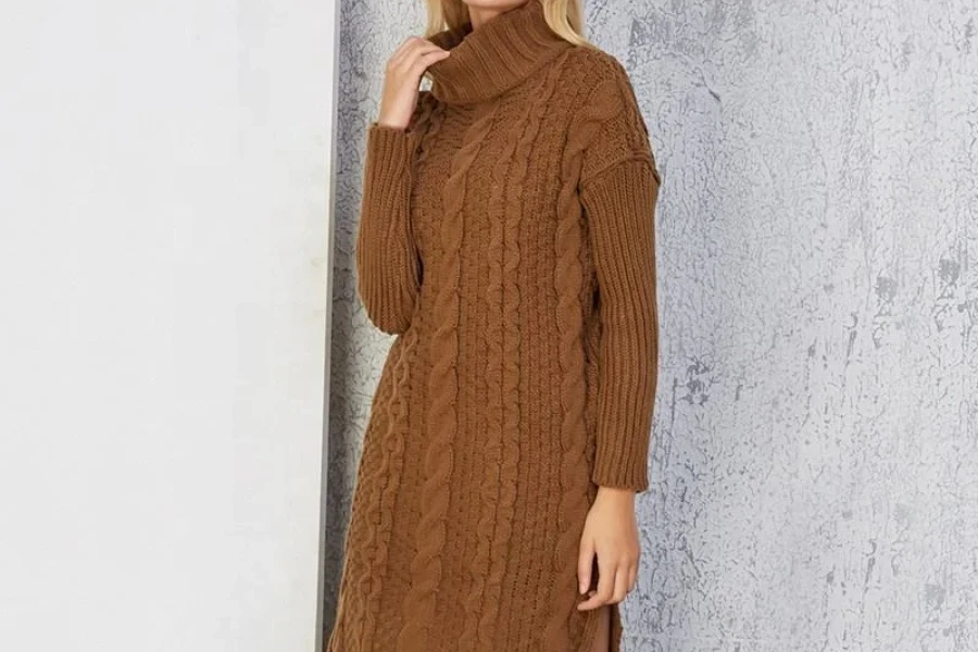 Blond woman wearing a brown ribbed long dress
