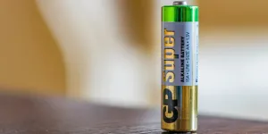 Closeup alkaline battery on a table