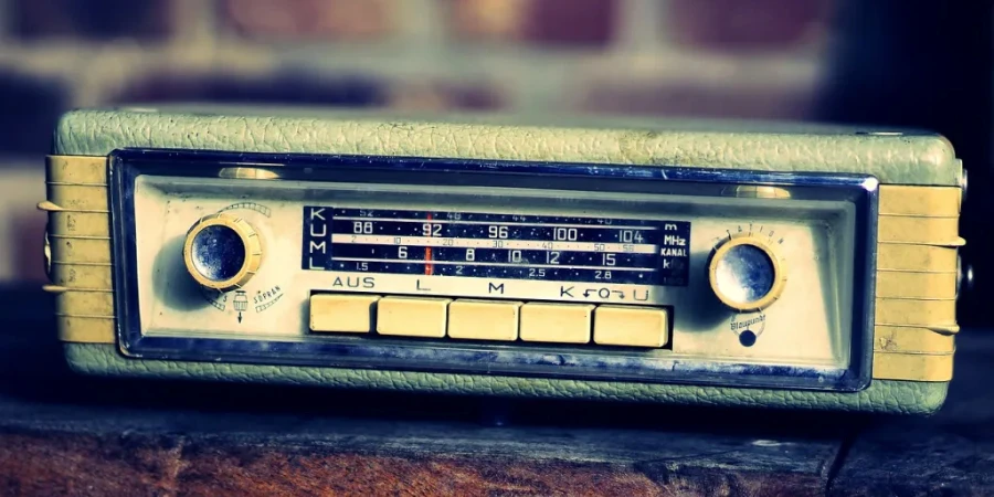 Closeups of retro car radio receiver with two dials