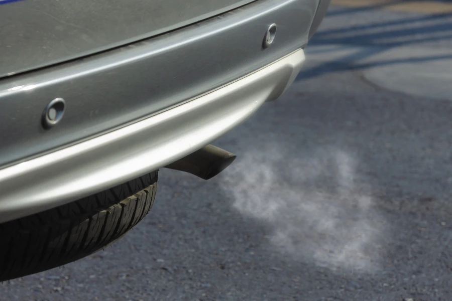 smoke coming out from car’s exhaust pipe