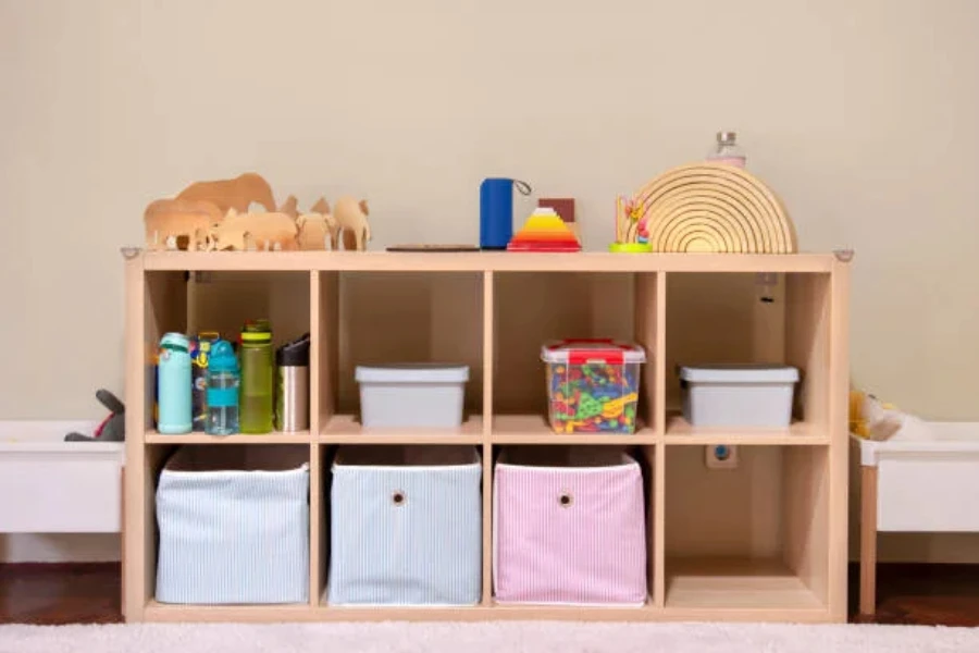 Wooden storage cabinet with school supplies on shelves