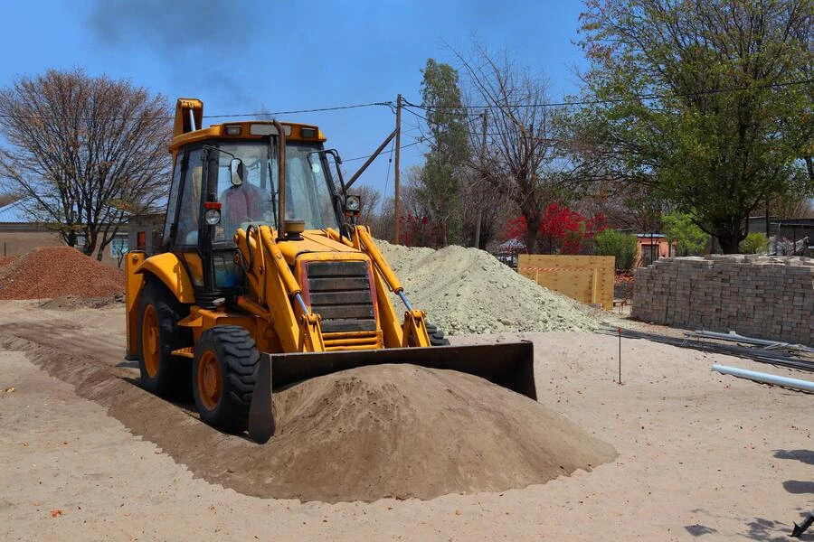 A bulldozer pulling soil