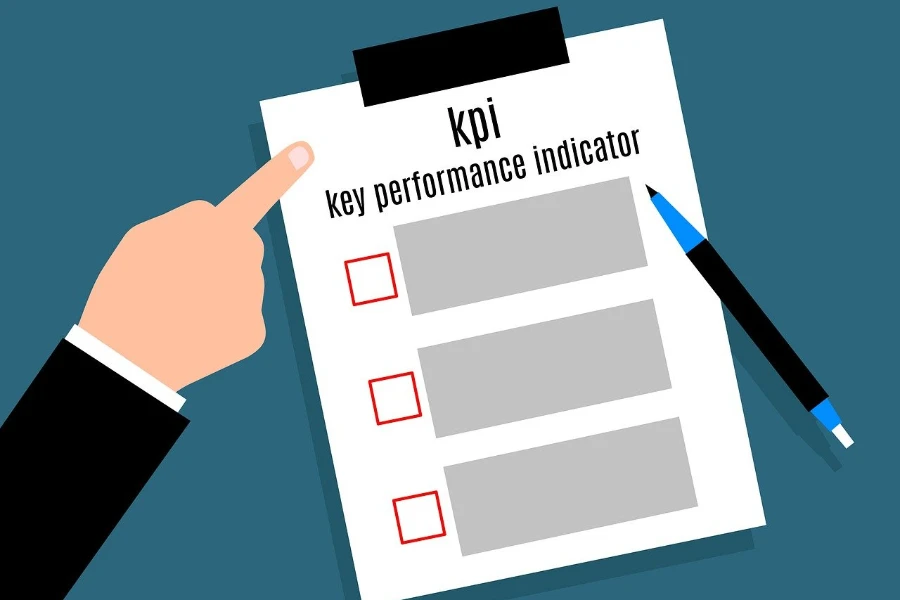 A hand pointing to a check-list of key performance indicators