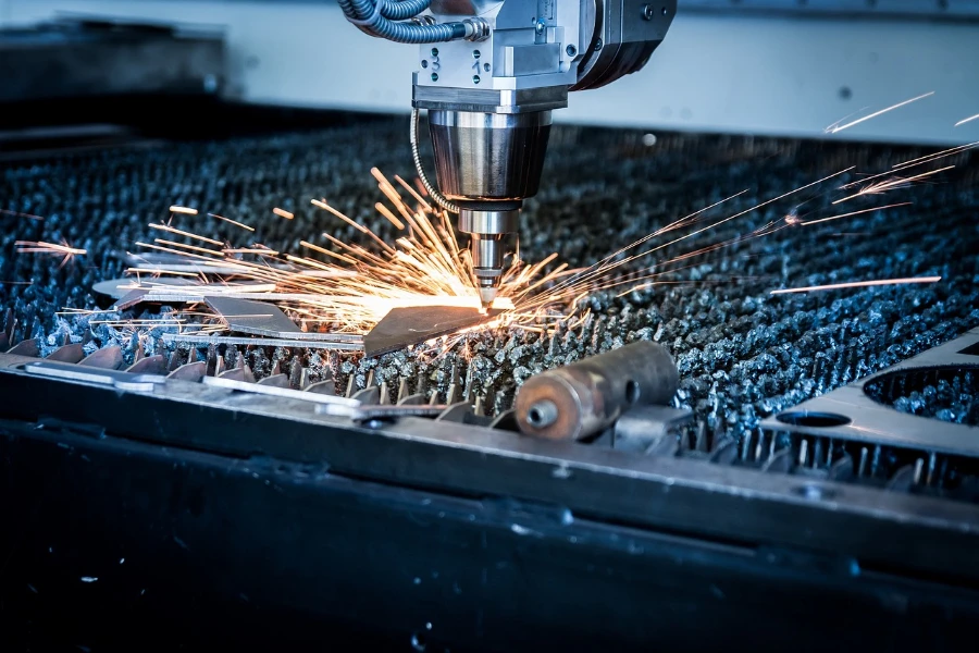 A laser-cutting machine cutting some metal pieces