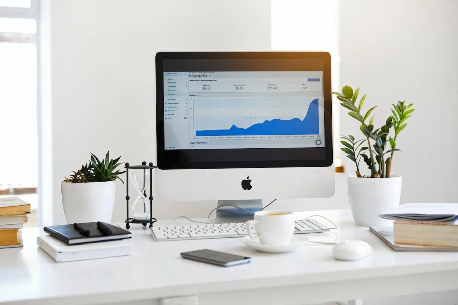 A Mac desktop displaying a line graph
