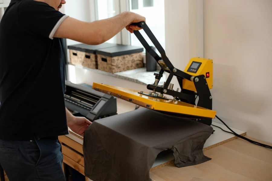 A man using a heat transfer printer