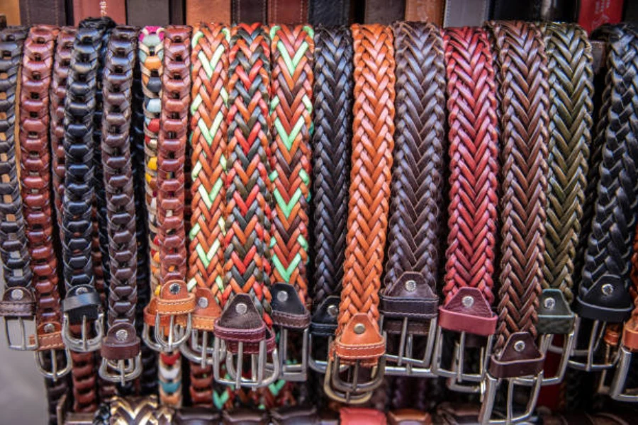 A rack of different color braided belts