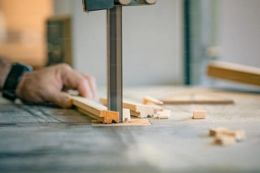 A sawmill in the process of slicing a wood