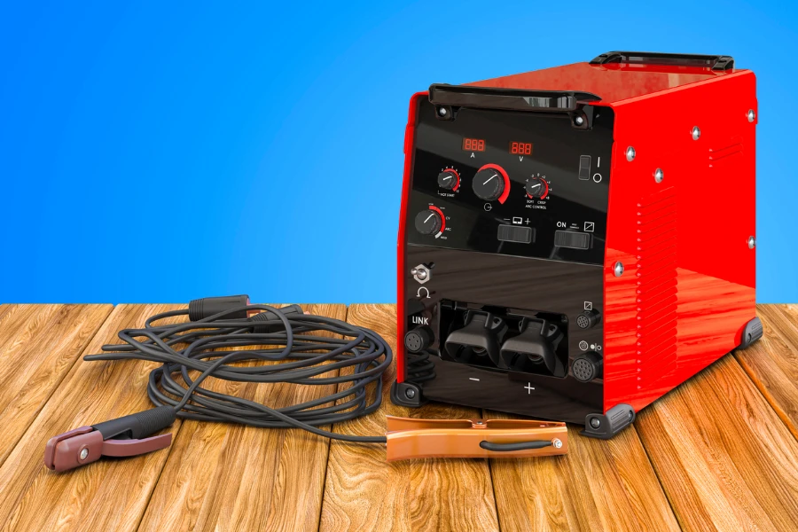 A welding machine on a wooden table