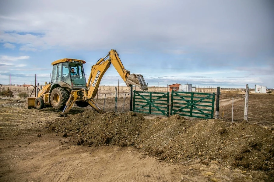 An excavator in a field