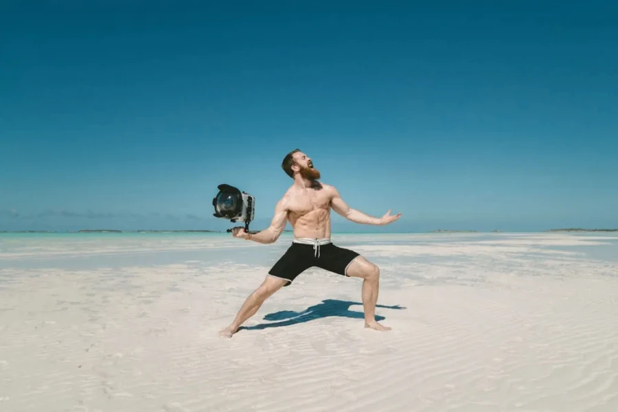 Content creator capturing content on a beach