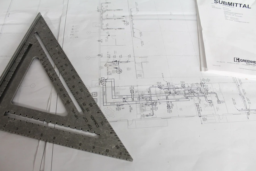 Engineering blueprints on a table