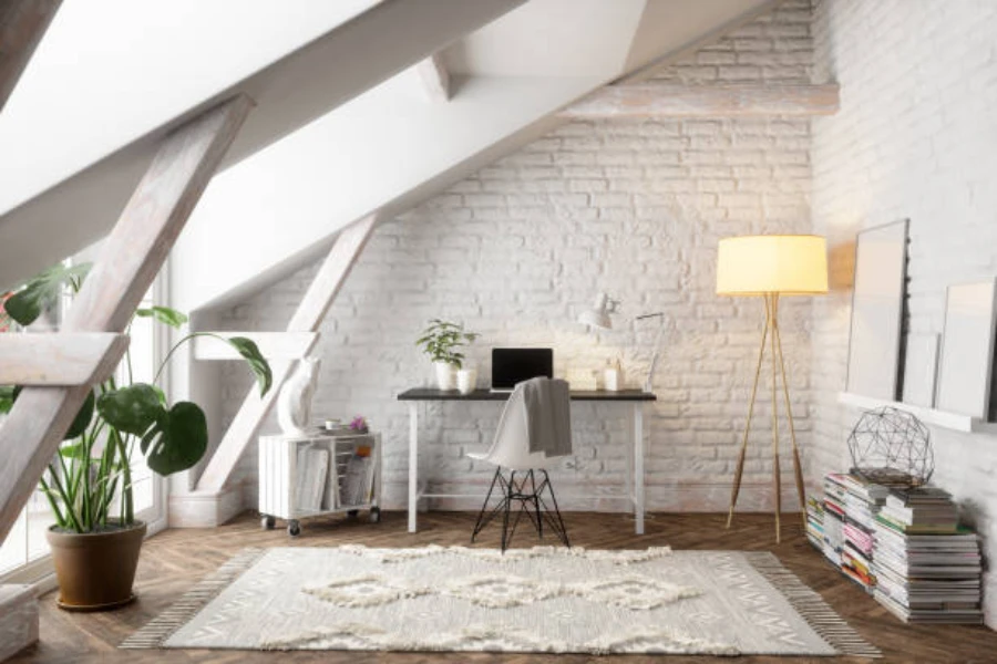 Interior space with desk and thin wooden floor lamp