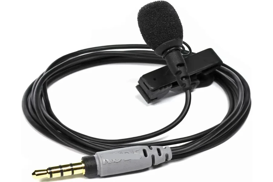 Lavalier microphone rolled up on white background