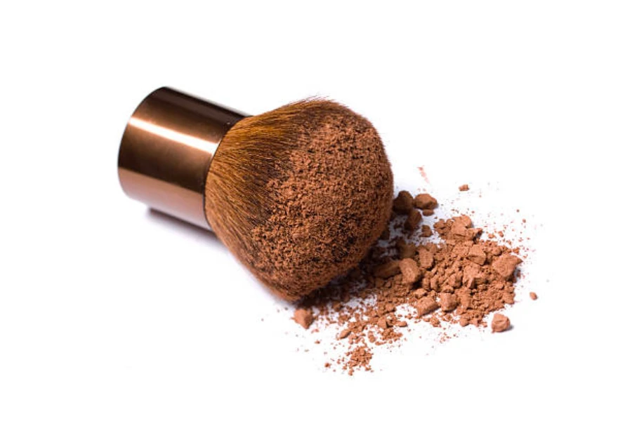 Multi-task buffing brush with bronzer on the end
