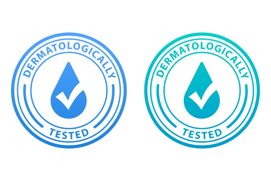 Dos insignias con símbolos dermatológicamente probados