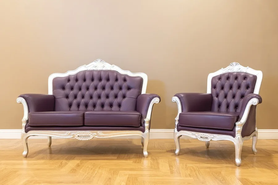 Two upholstered chairs and hardwood floor