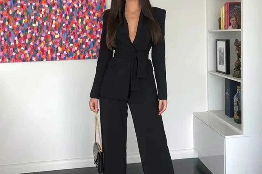 woman wearing a black glam suit