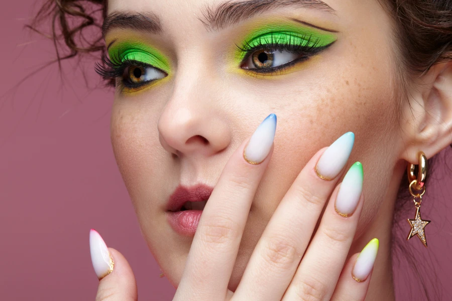 Woman with eye makeup and nails done