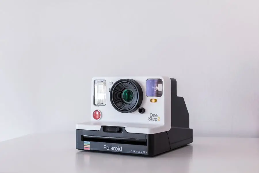 A black and white Polaroid camera