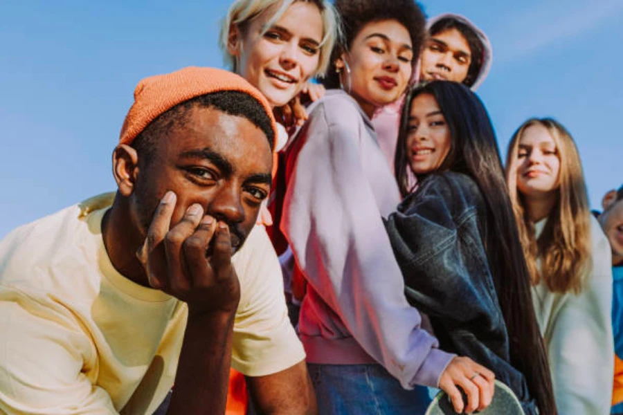 A diverse group of young adults standing together