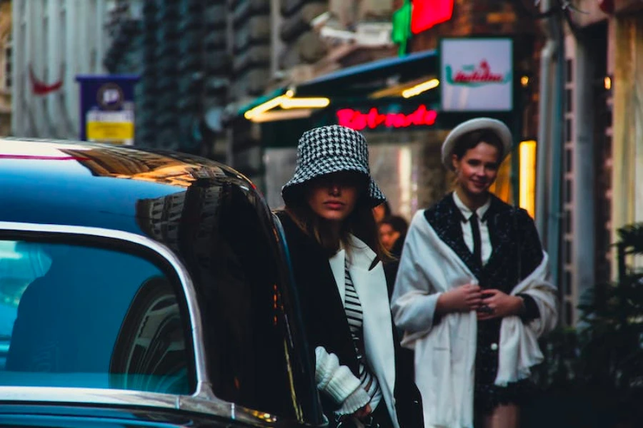 A woman wearing a checkered style bucket hat