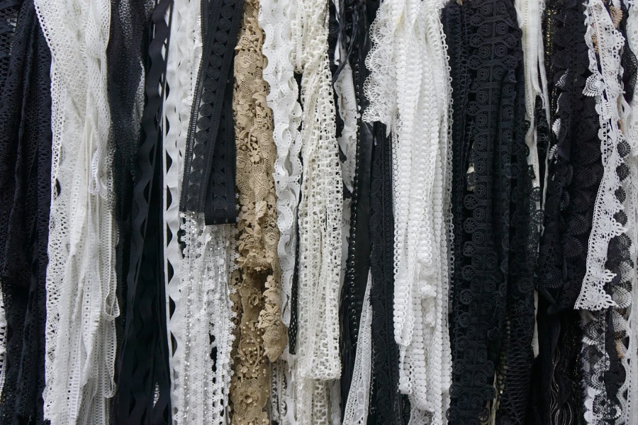 Black and white women’s lace on a rail