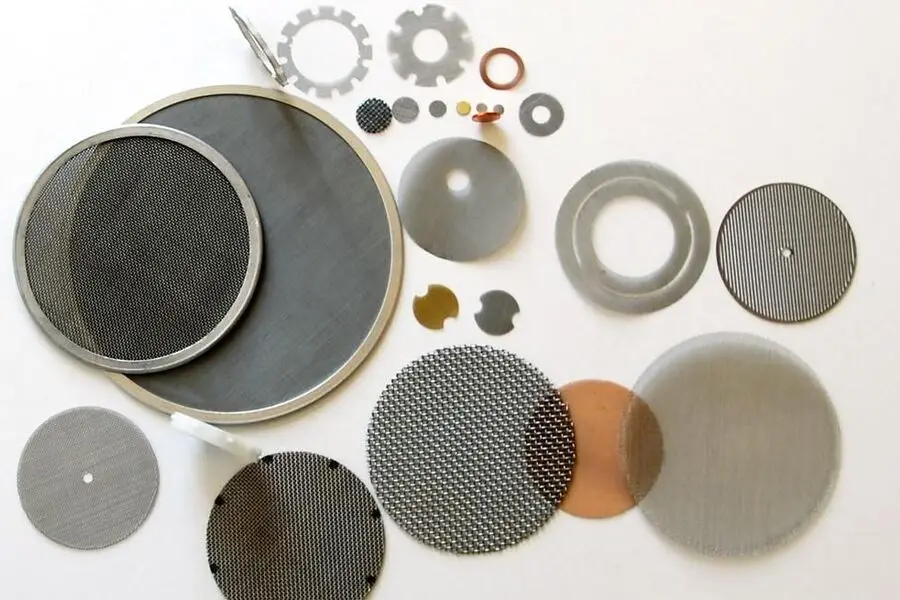 Punched parts of a filtration and sieving system